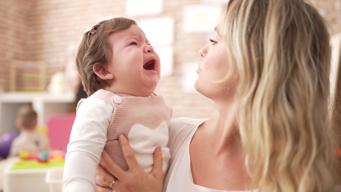 Mother,And,Daughter,Consueling,Baby,Crying,At,Kindergarten