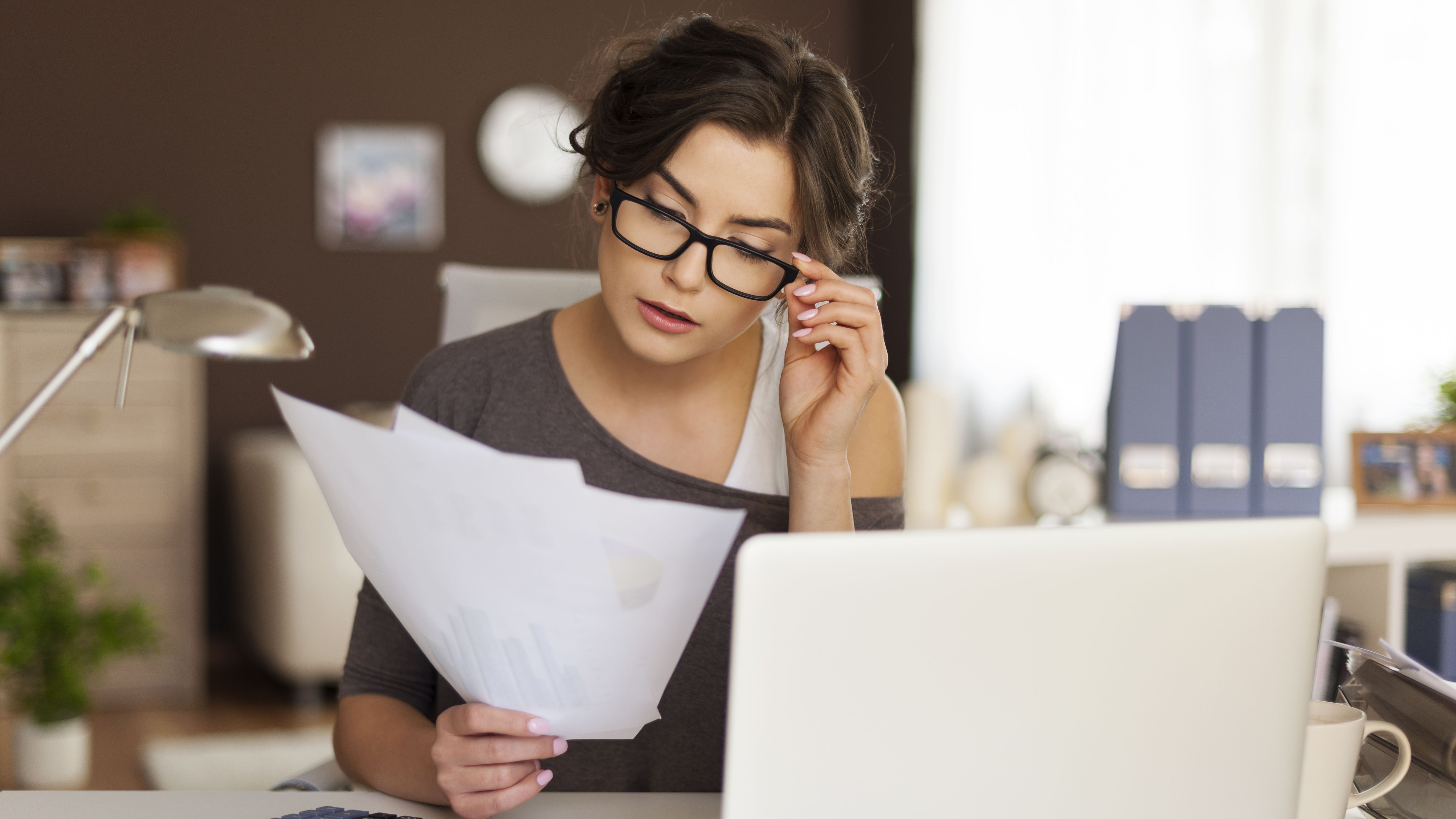 Young Woman Hard Working At Home