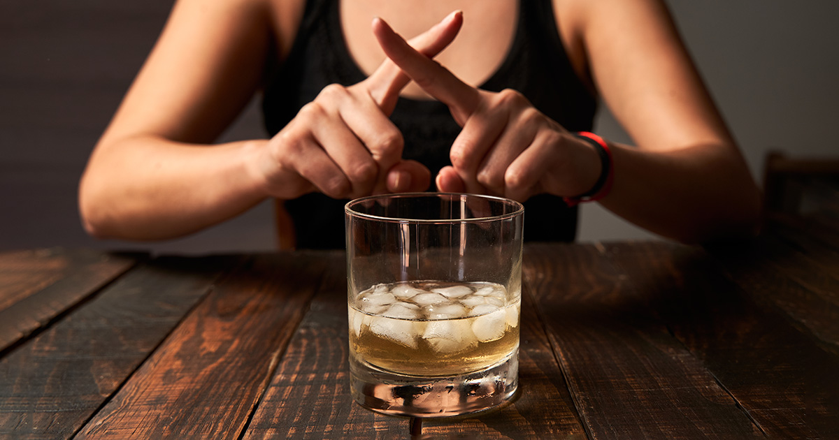 Woman Saying No To Drinking