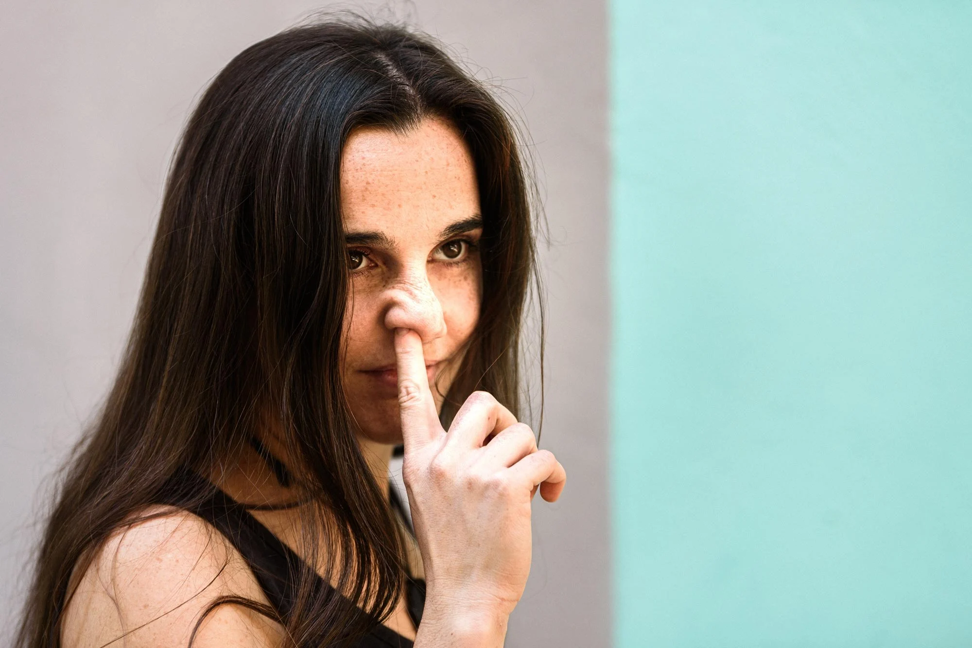 Woman Picking Nose