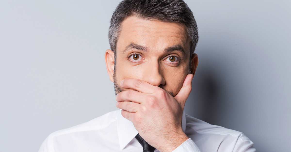 9892 Man Covering Mouth Rude Words Gettyimages G S