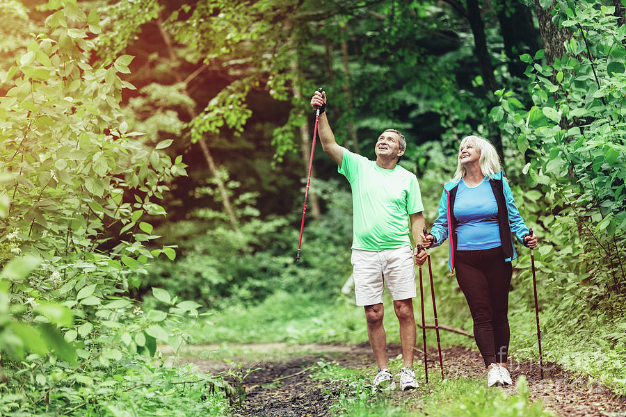 Elderly Couple Admiring Nature And Walking Michal Bednarek