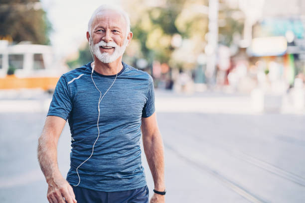 Senior Athlete Walking Outdoors In The City